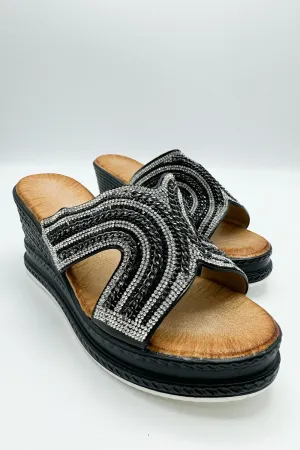 Hestia Diamante Strap Wedge Mules in Black